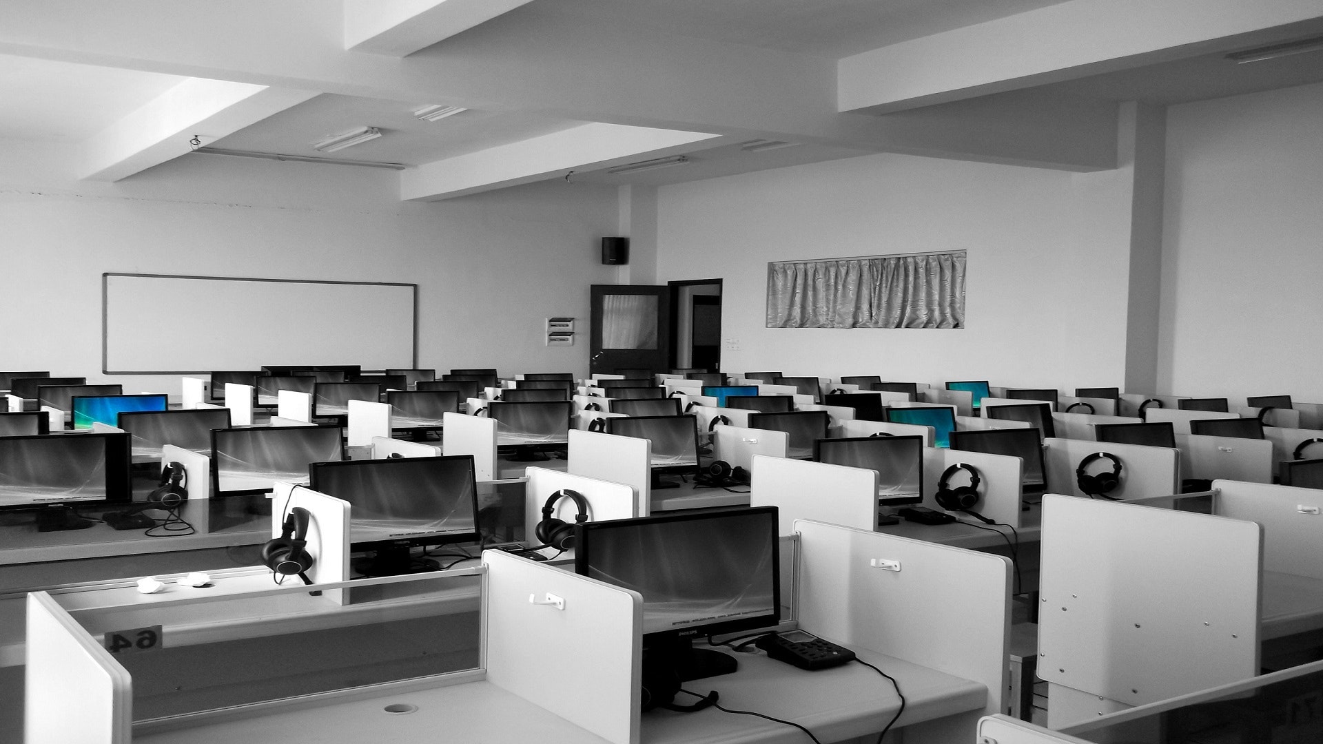 office space with cubicles and computers